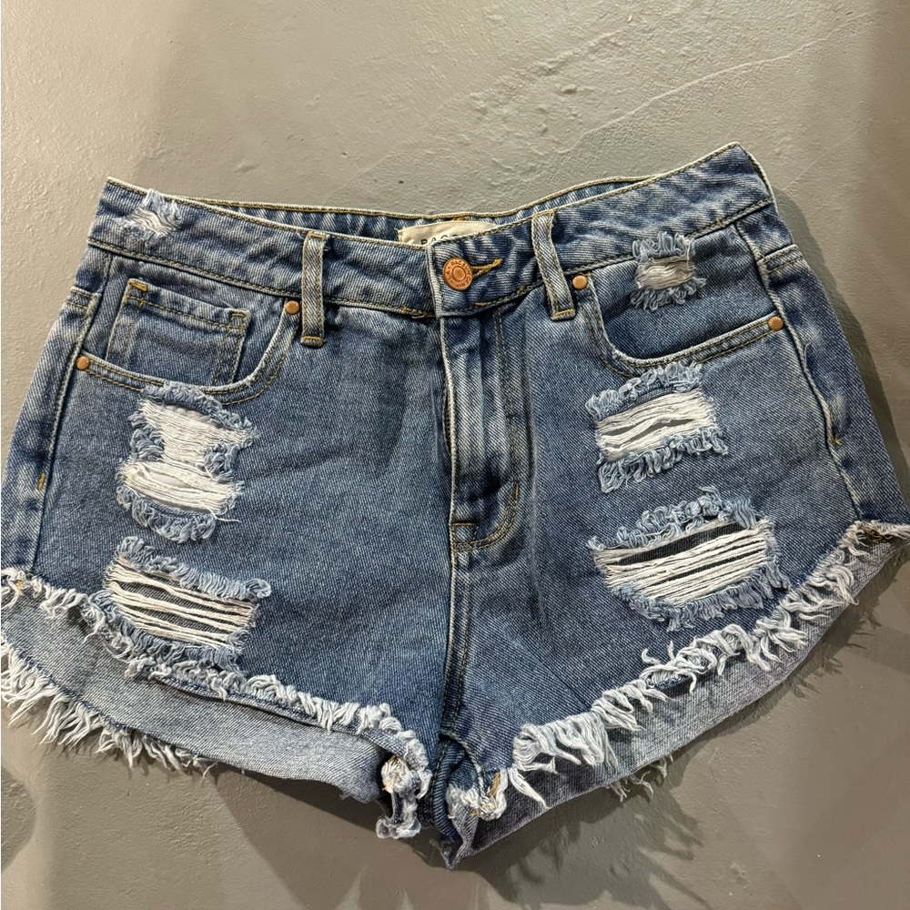 Distressed denim shorts